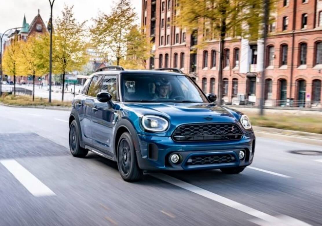 2022 MINI Cooper Countryman Driving On The Street - Feature Image