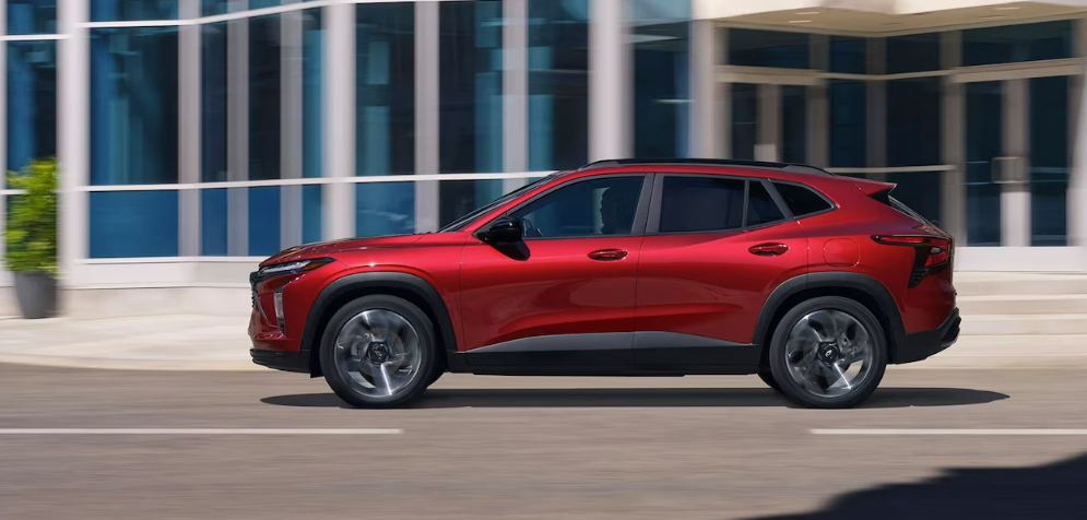 2024 Chevy Trax in red running with a side view