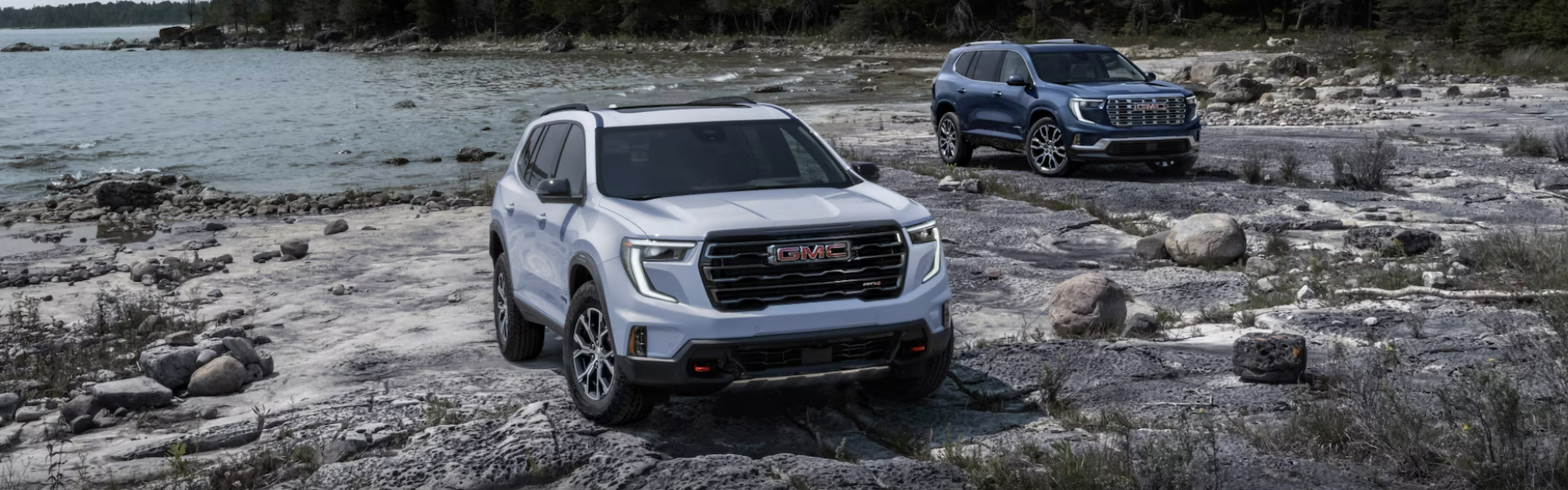 2024 GMC Acadia with lake background banner
