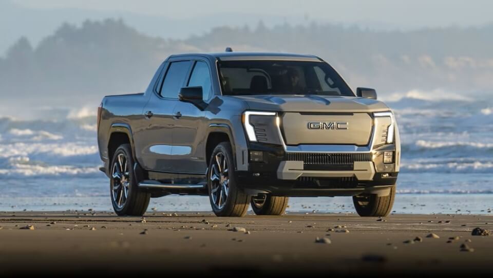 2024 GMC Sierra EV Denali Edition 1 Parked On A Beach Design