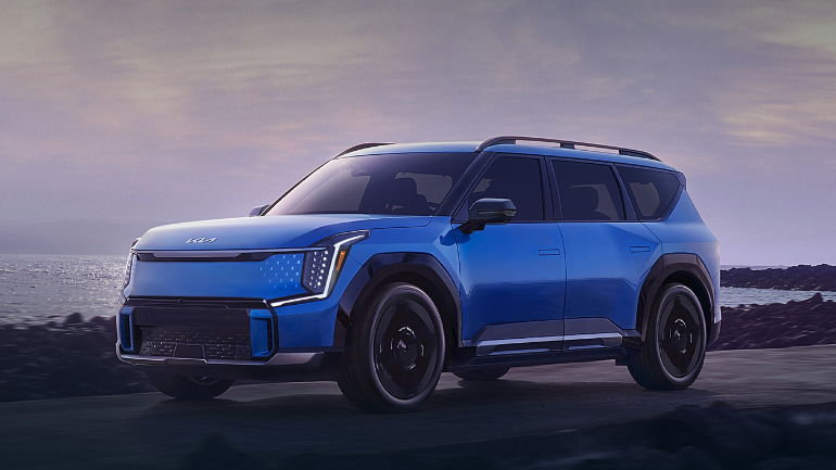 2024 Kia EV9 in blue running with side view-Features