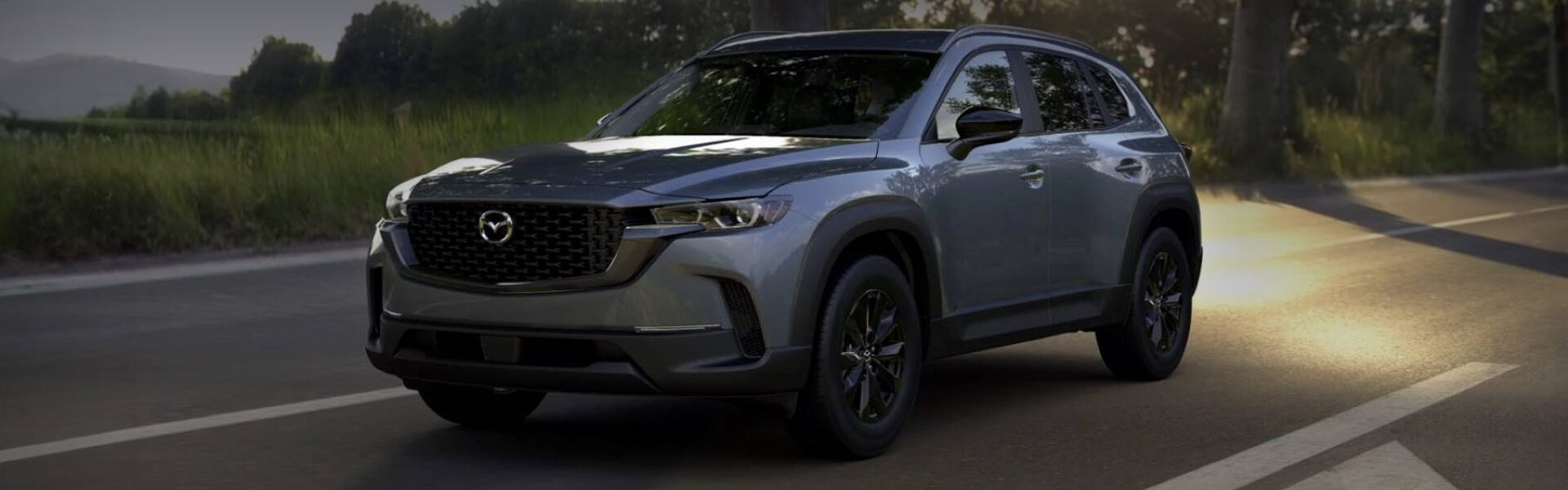 2024 Mazda CX-50 Driving Down The Road Banner