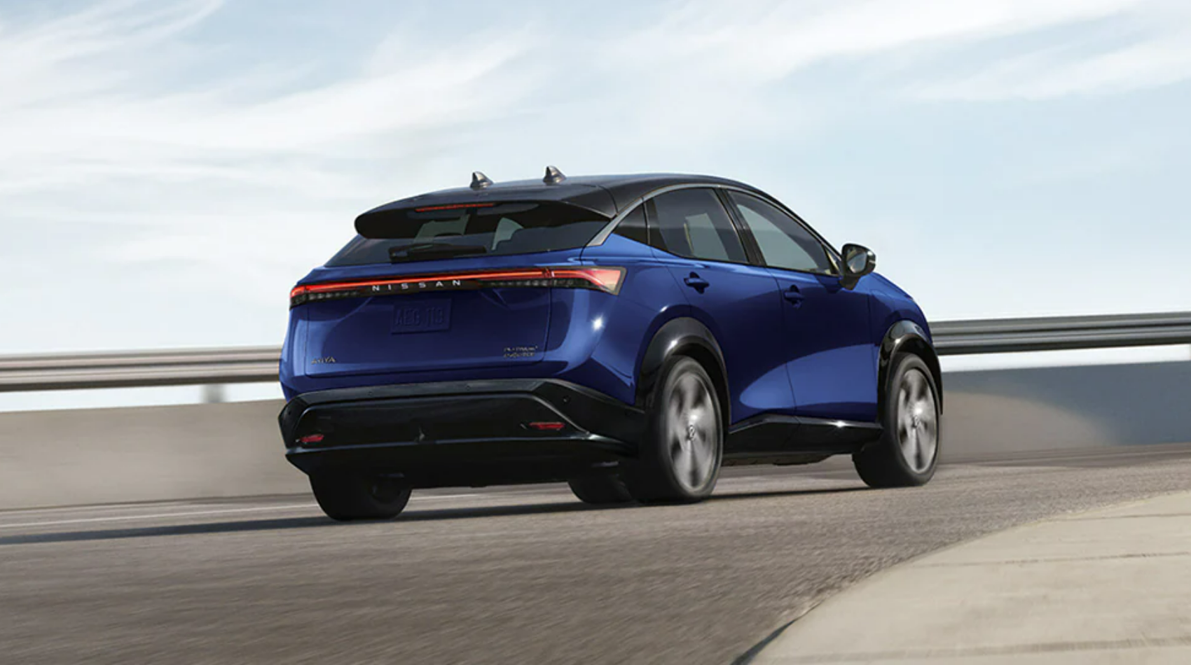 2024 Nissan Ariya in blue with rear view