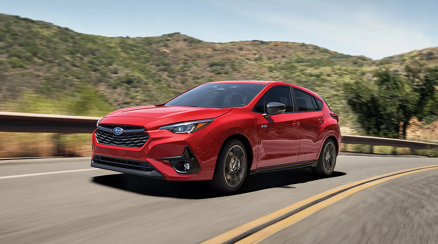 2024 Subaru Impreza in red running with front  and side view-features