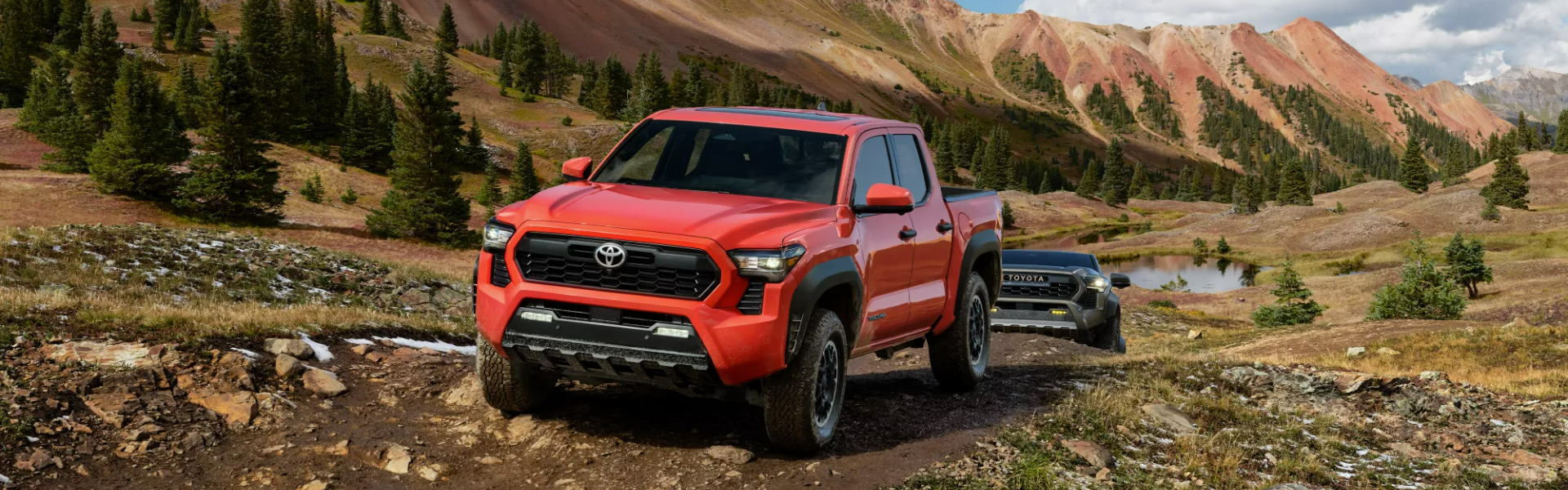 2024 Toyota Tacoma in red with front view For Sale