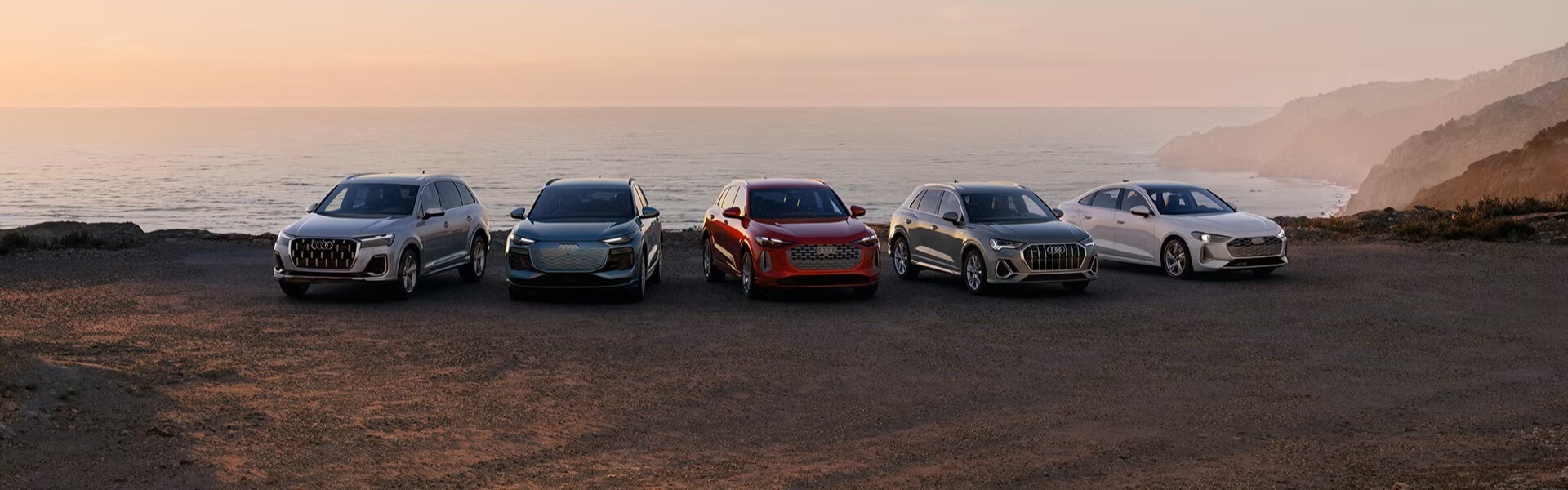 2025 Audi Models Parked Near Water Banner