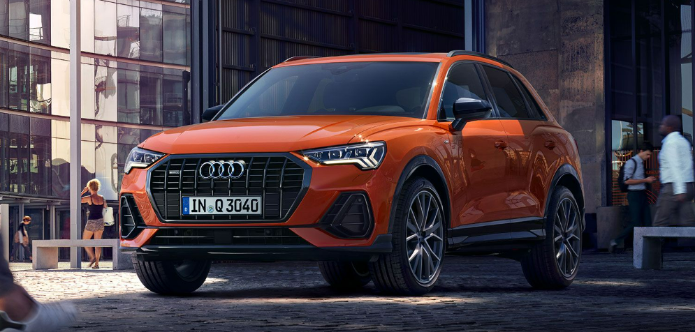 2025 Audi Q3 in an urban setting, captured from a front-facing angle-Features