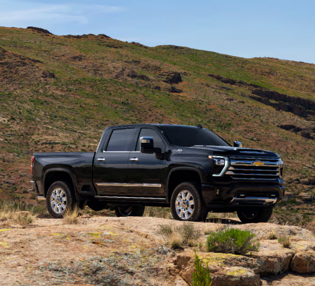 2025 Chevy Silverado 3500 HD in black parked with side view-Features