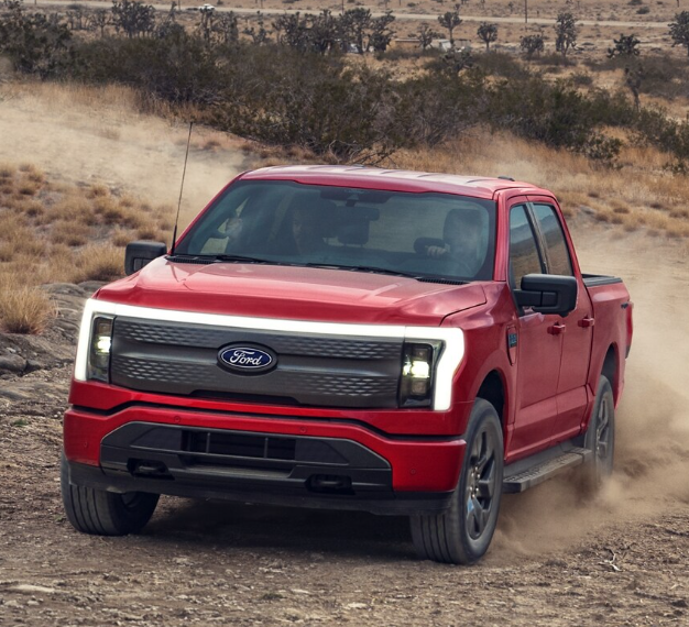 2025 Ford F-150 Lightning in red running with front view-feature