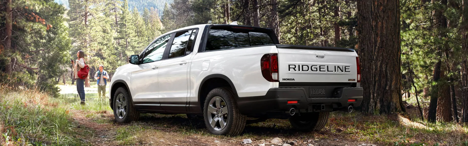 2025 Honda Ridgeline parked in a scenic outdoor setting-Banner