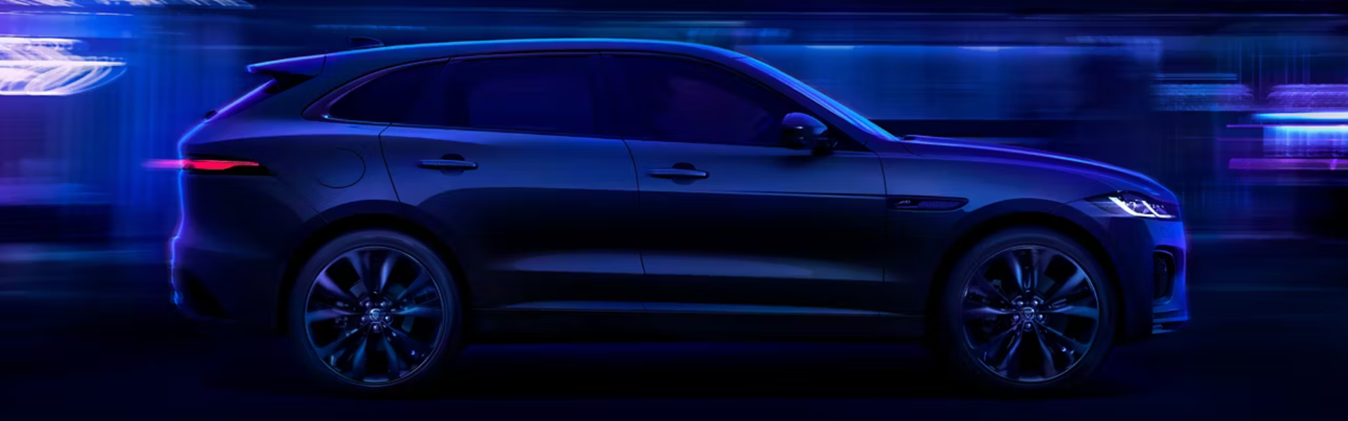 2025 Jaguar F-PACE running with side view-Banner