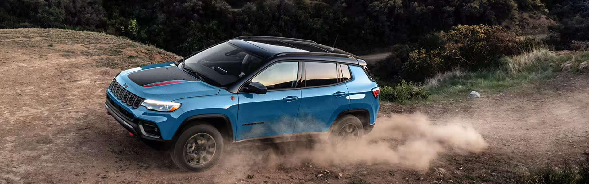 2025 Jeep Compass Driving Off-Road Banner