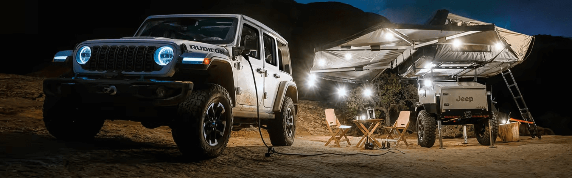 2025 Jeep Wrangler 4xe Rubicon X Parked Off-Road In The Desert Banner