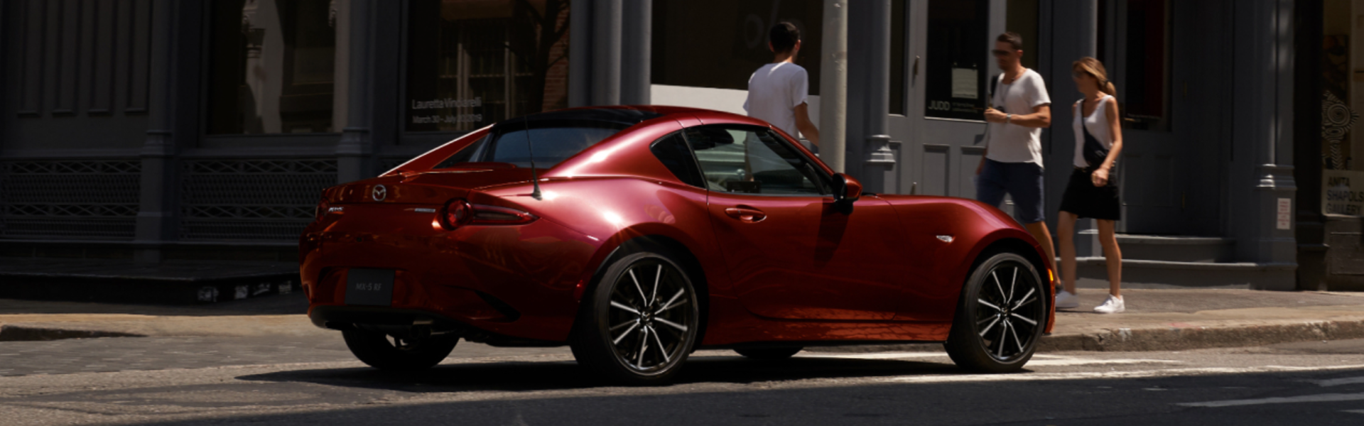2025 Mazda MX-5 Miata RF parked with rear view-banner