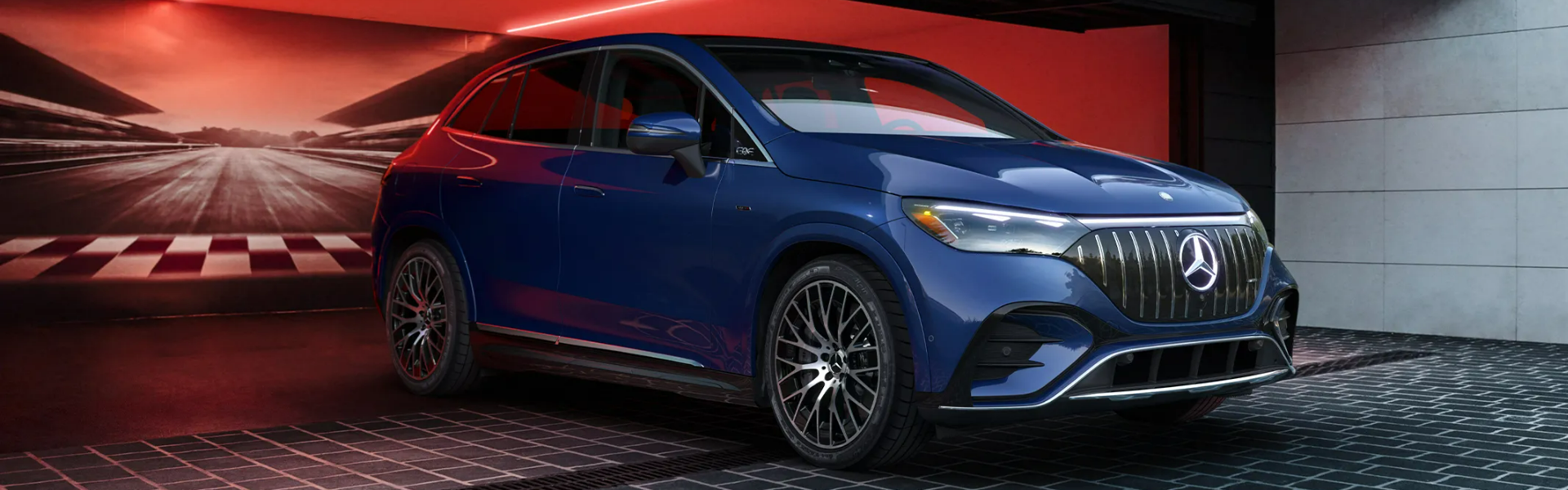 2025 Mercedes-Benz EQE in blue with front view and side view-Banner