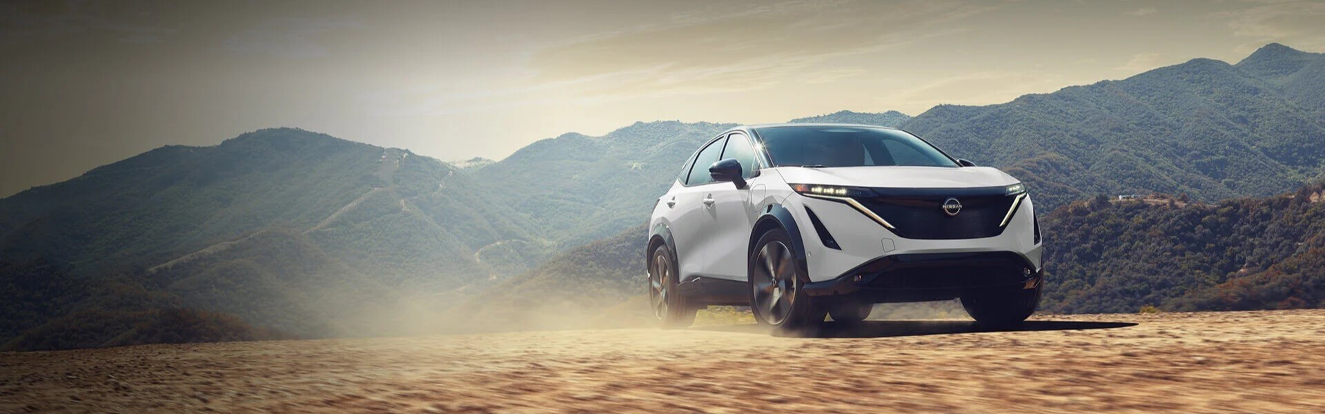 2025 Nissan ARIYA Parked In A Desert Banner