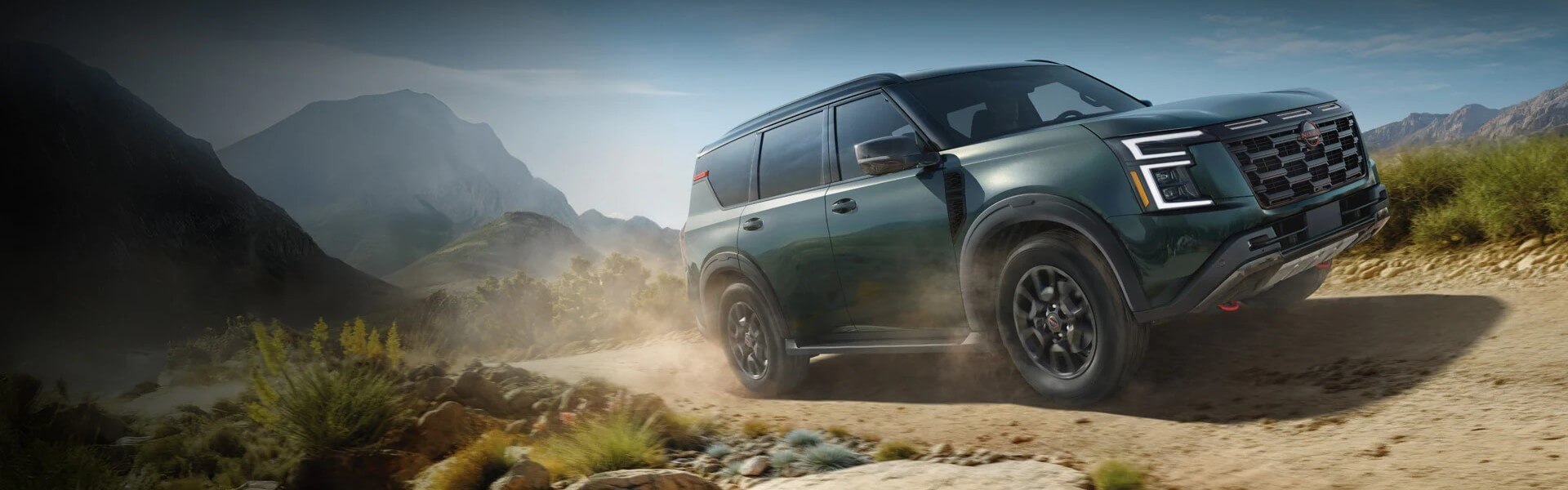 2025 Nissan Armada Driving In The Desert Banner