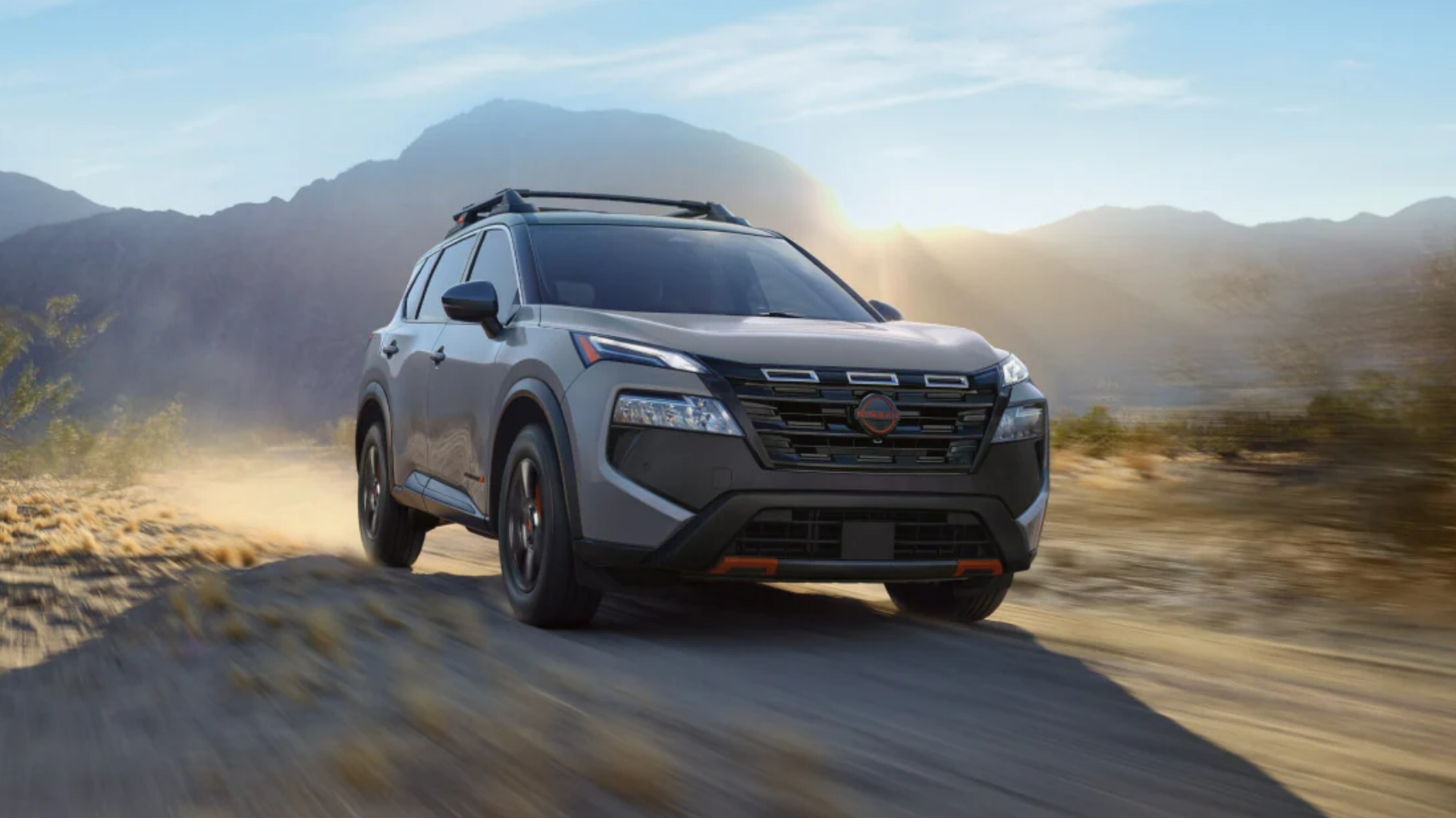 2025 Nissan Rogue Rock Creek driving through a desert-like environment-Features