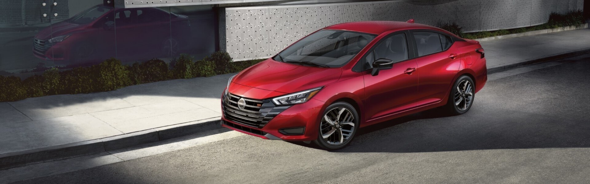 2025 Nissan Versa Parked On The Street Banner