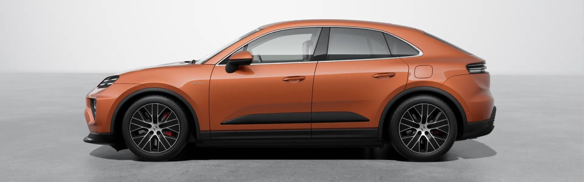 2025 Porsche Macan 4S Electric In Papaya Metallic Banner