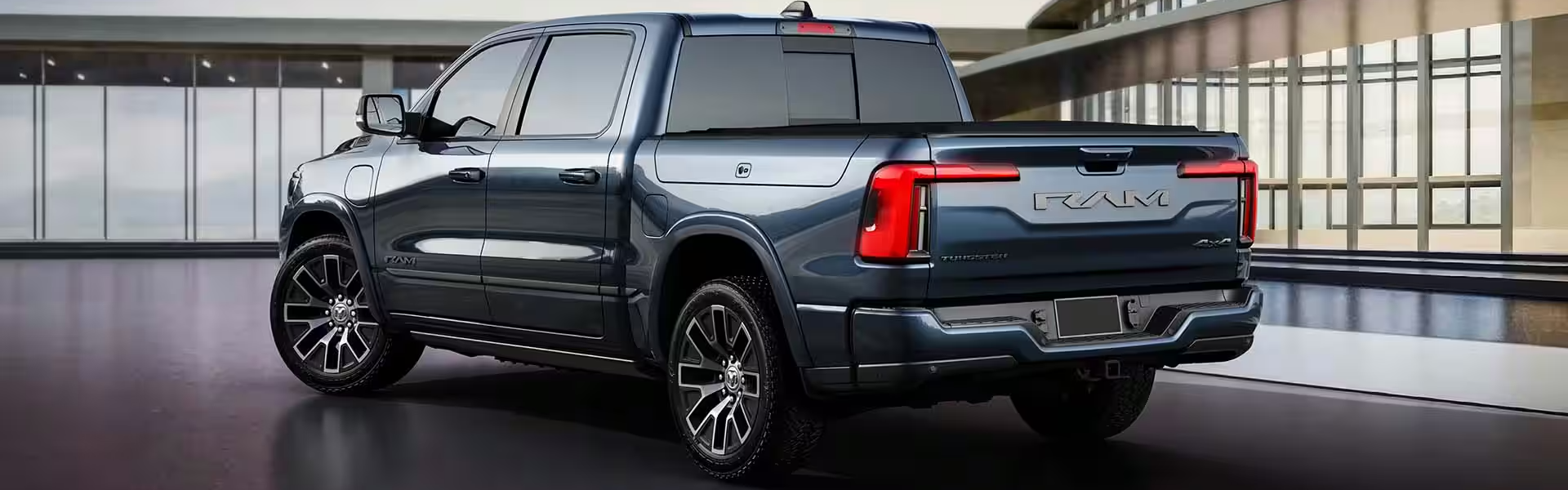 2025 RAM 1500 Ramcharger parked with rear and side view-Banner