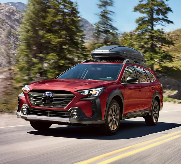 2025 Subaru Outback in red running with front view-Features