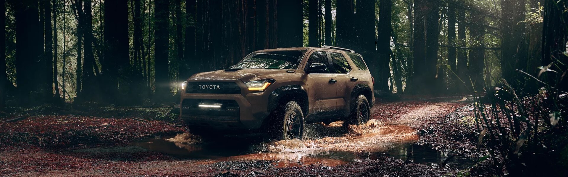 2025 Toyota 4Runner Off-Roading In The Forest Banner