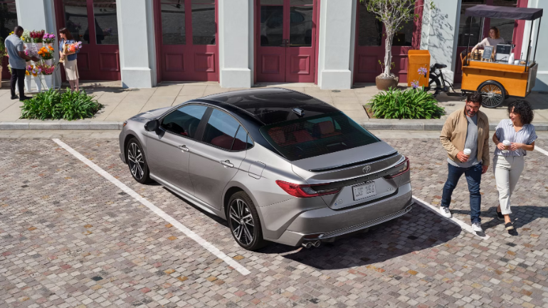 2025 Toyota Camry parking with top view and rear view