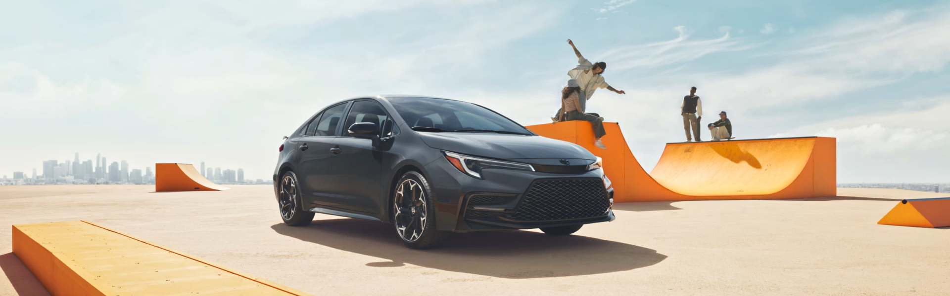 2025 Toyota Corolla in black parking with front view and side view-Banner