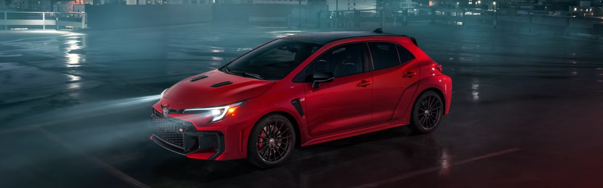 2025 Toyota GR Corolla in red parked with side view-banner