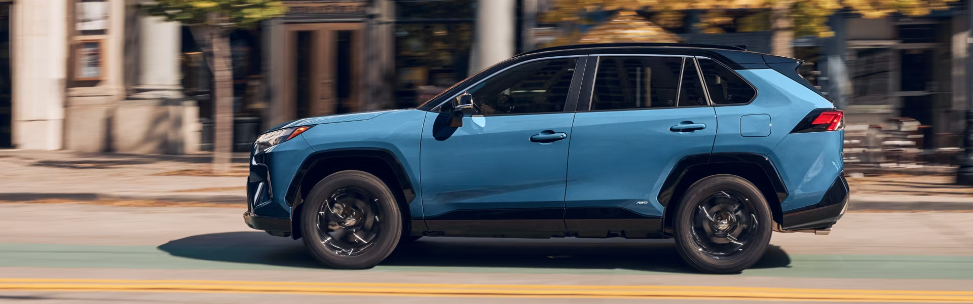 2025 Toyota RAV4 running high-speed on street with side view-For Sale