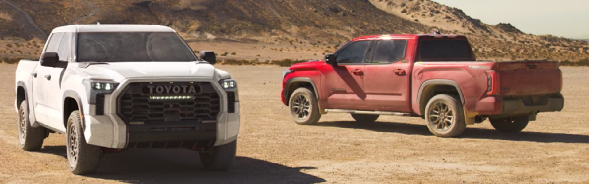 2025 Toyota Tundra i-FORCE MAX parking on sand with front view-Banner