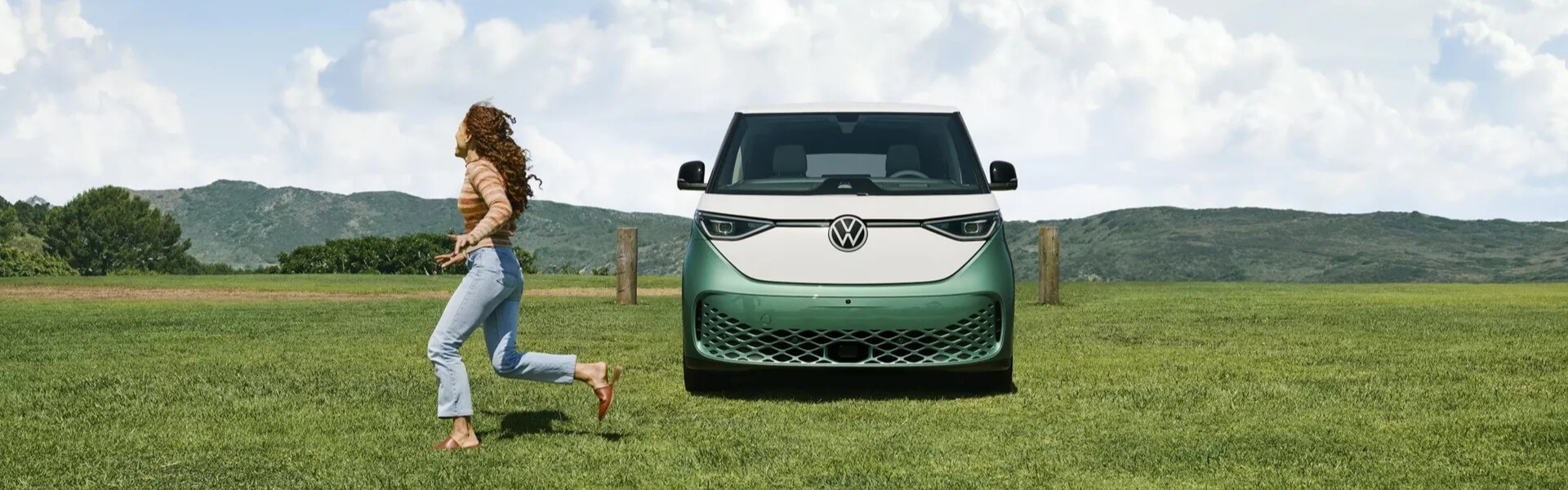2025 Volkswagen ID. Buzz Electric Bus Parked In A Field Banner