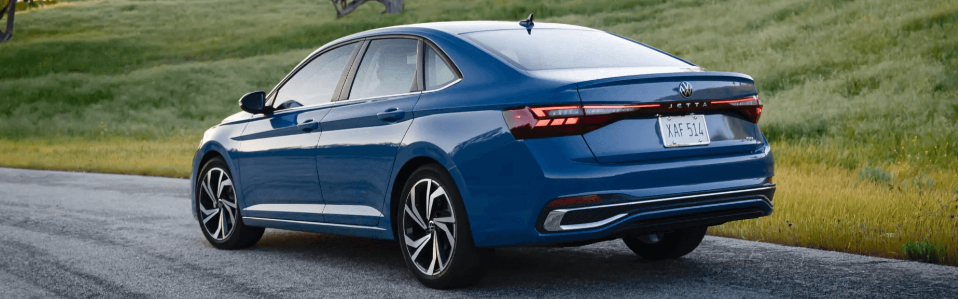 2025 Volkswagen Jetta in a blue running with rear and side view-For Sale