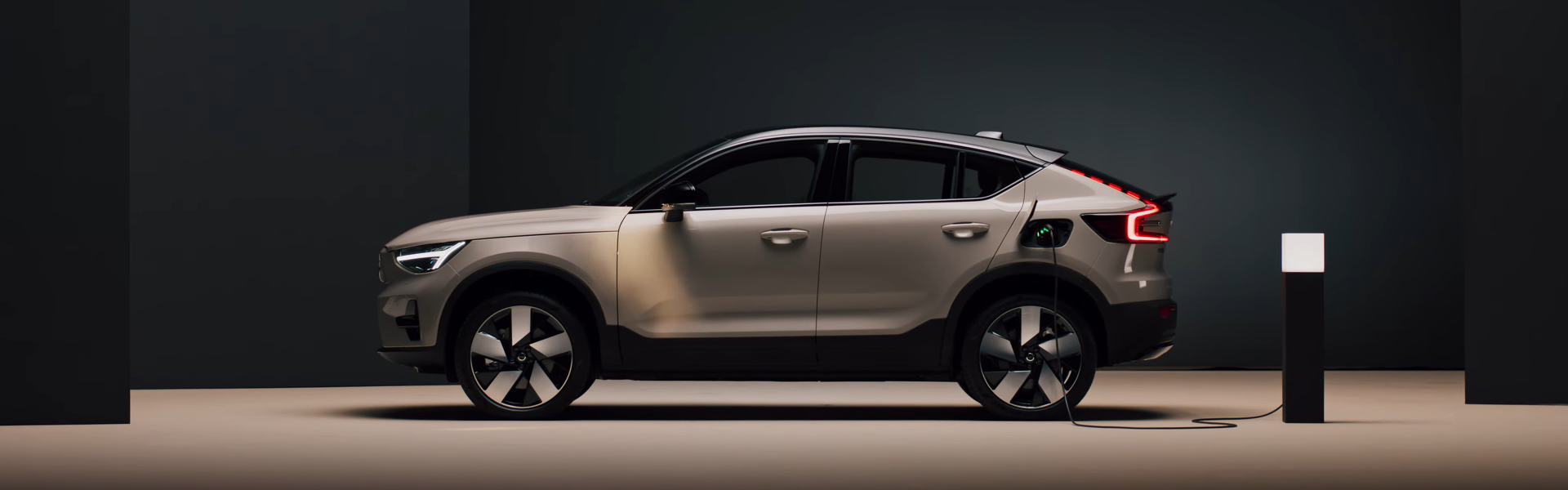 2025 Volvo EC40 SUV charging with side view-Banner