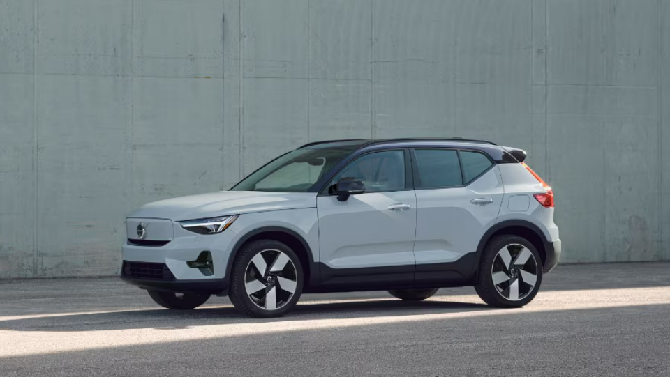 2025 Volvo EX40 in white parking with side view