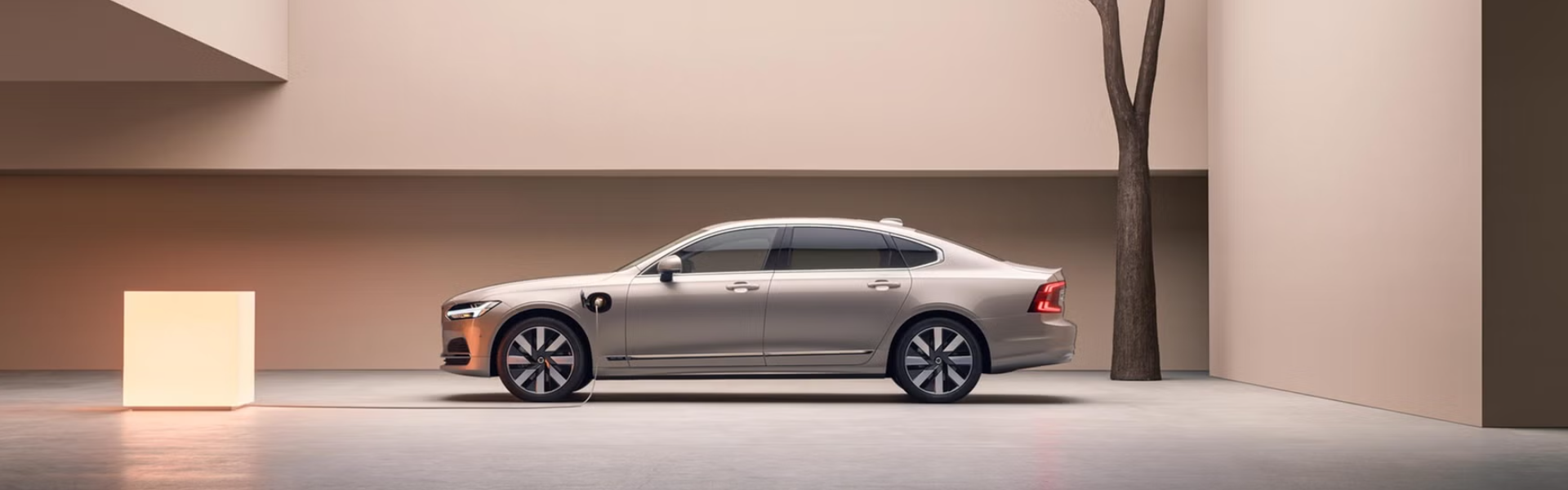 2025 Volvo S90 Plug-in Hybrid charging with side view-Banner