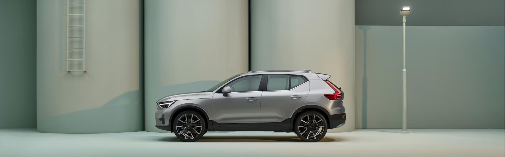 2025 Volvo XC40 in grey with side view BANNER