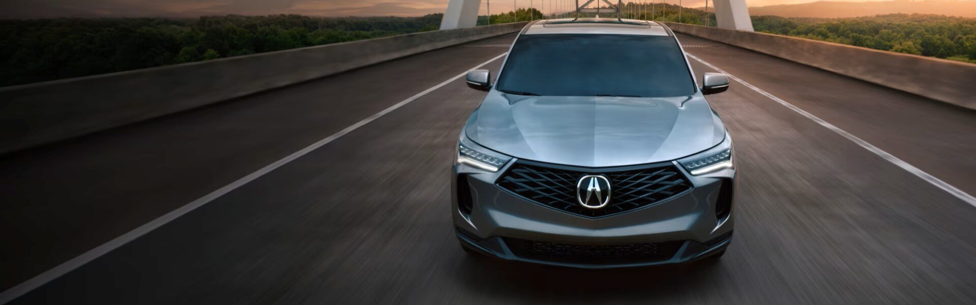 2026 Acura RDX Driving On A Bridge Banner