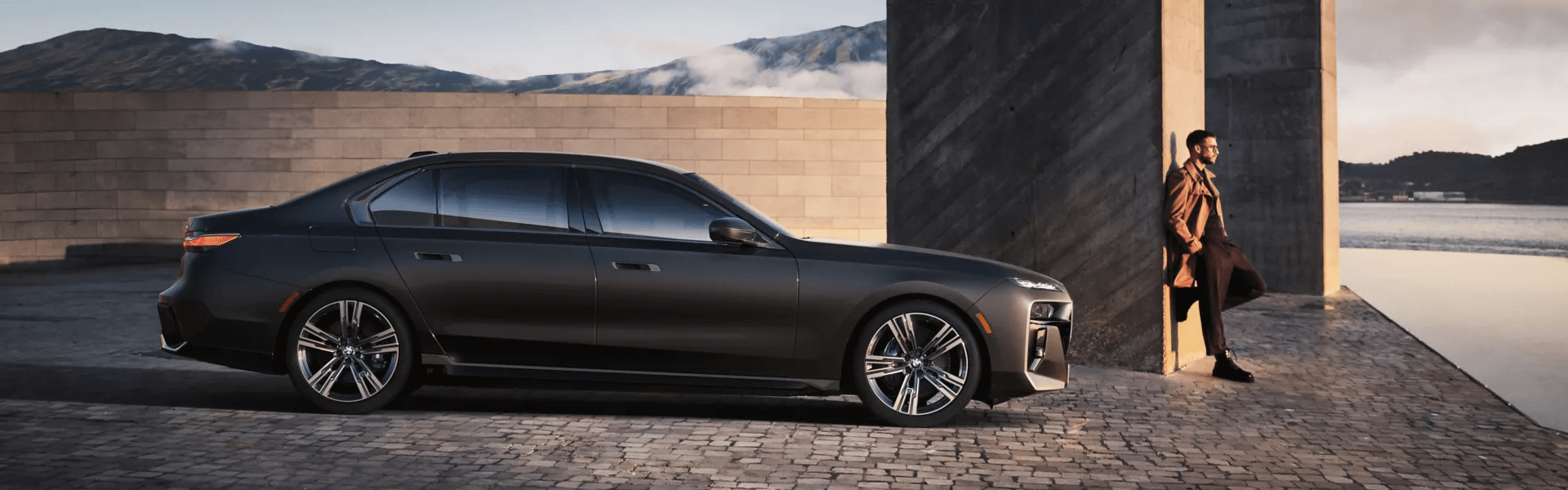 2026 BMW 7 Series Among Tall Pillars Banner