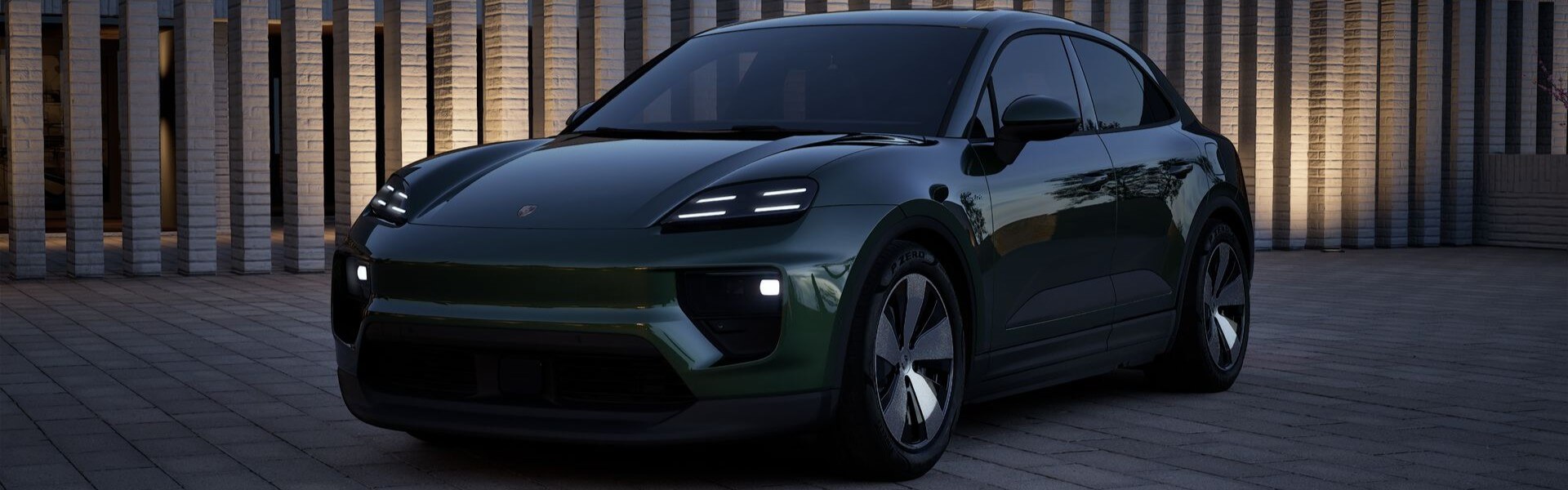 2026 Porsche Macan EV Exterior showing updated design and LED lighting in UAE setting