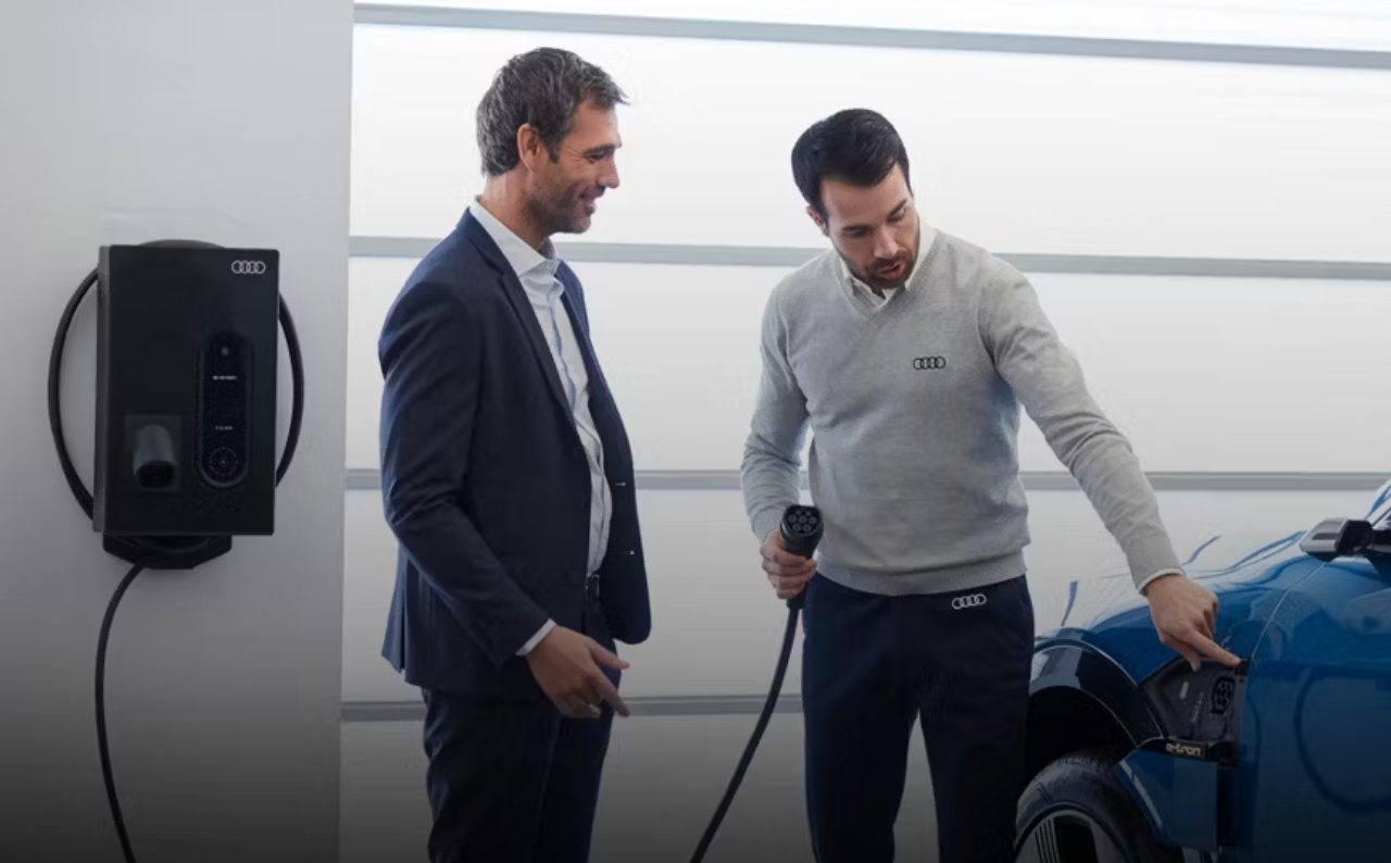 Audi technician explaining Audi EV service