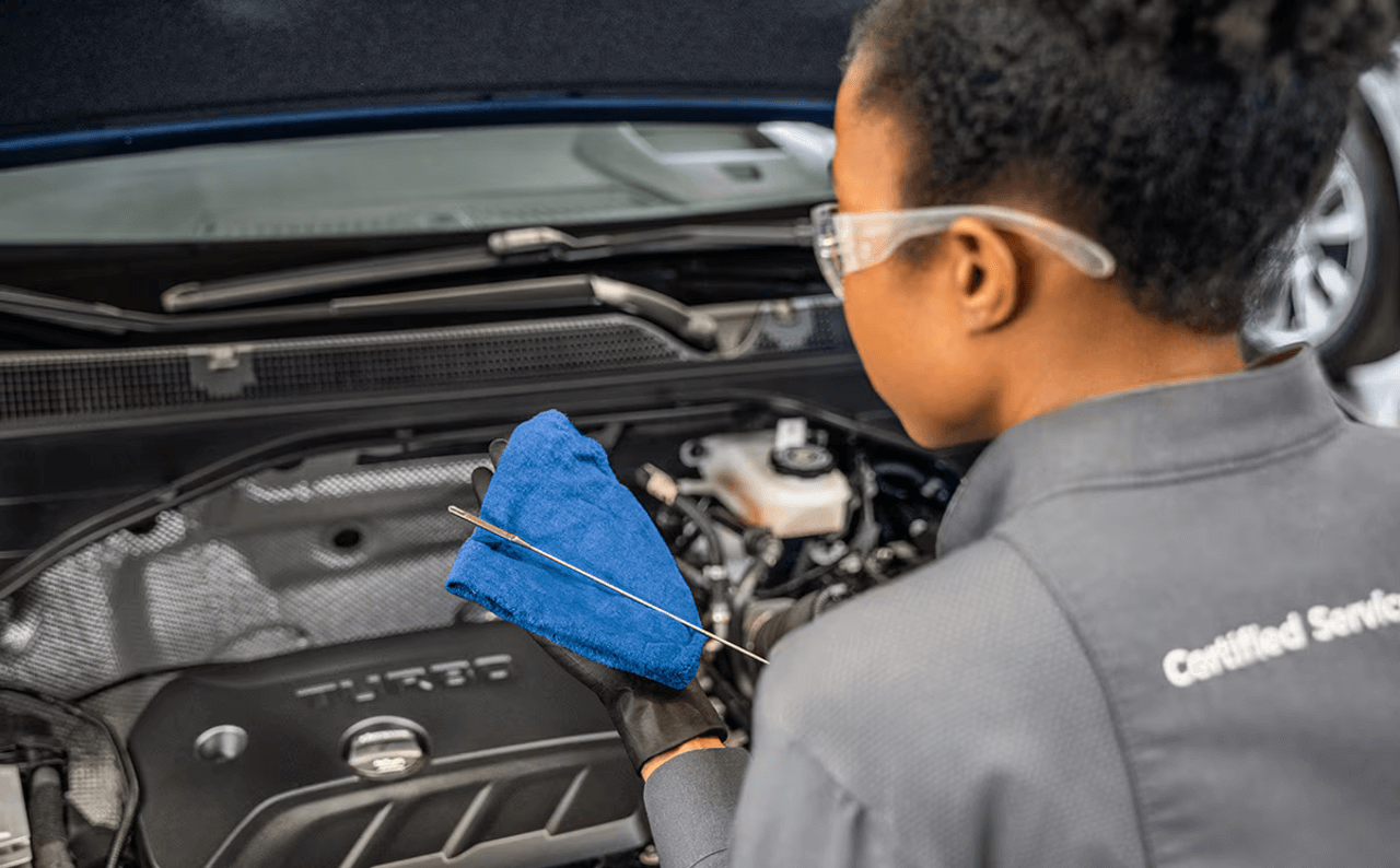 Buick Technician Conducting Oil Change