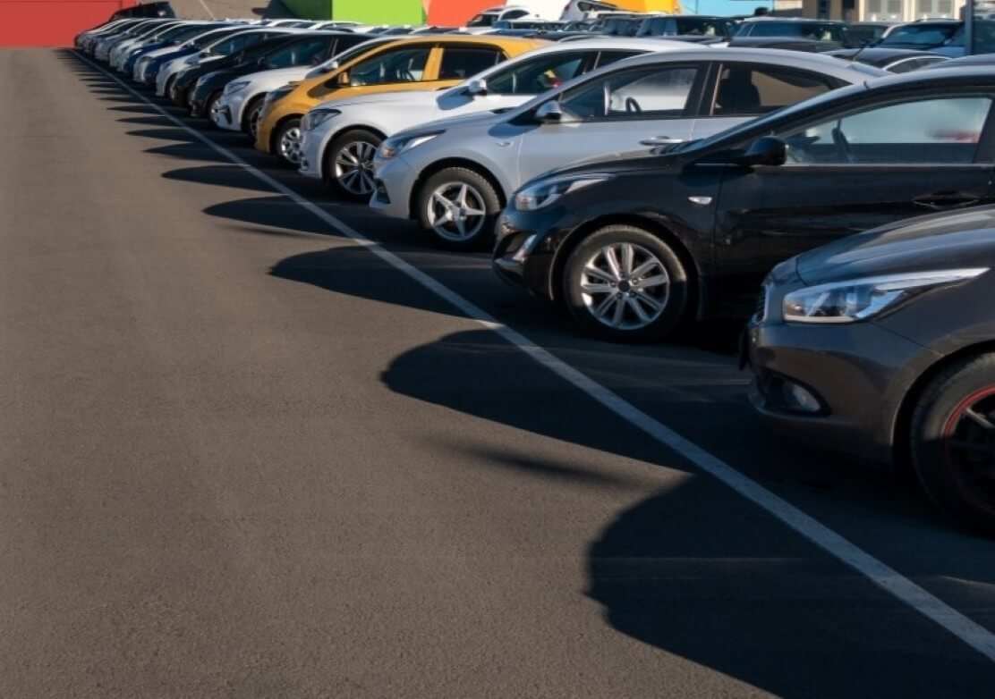 Cars In A Dealership Lot - Feature Image