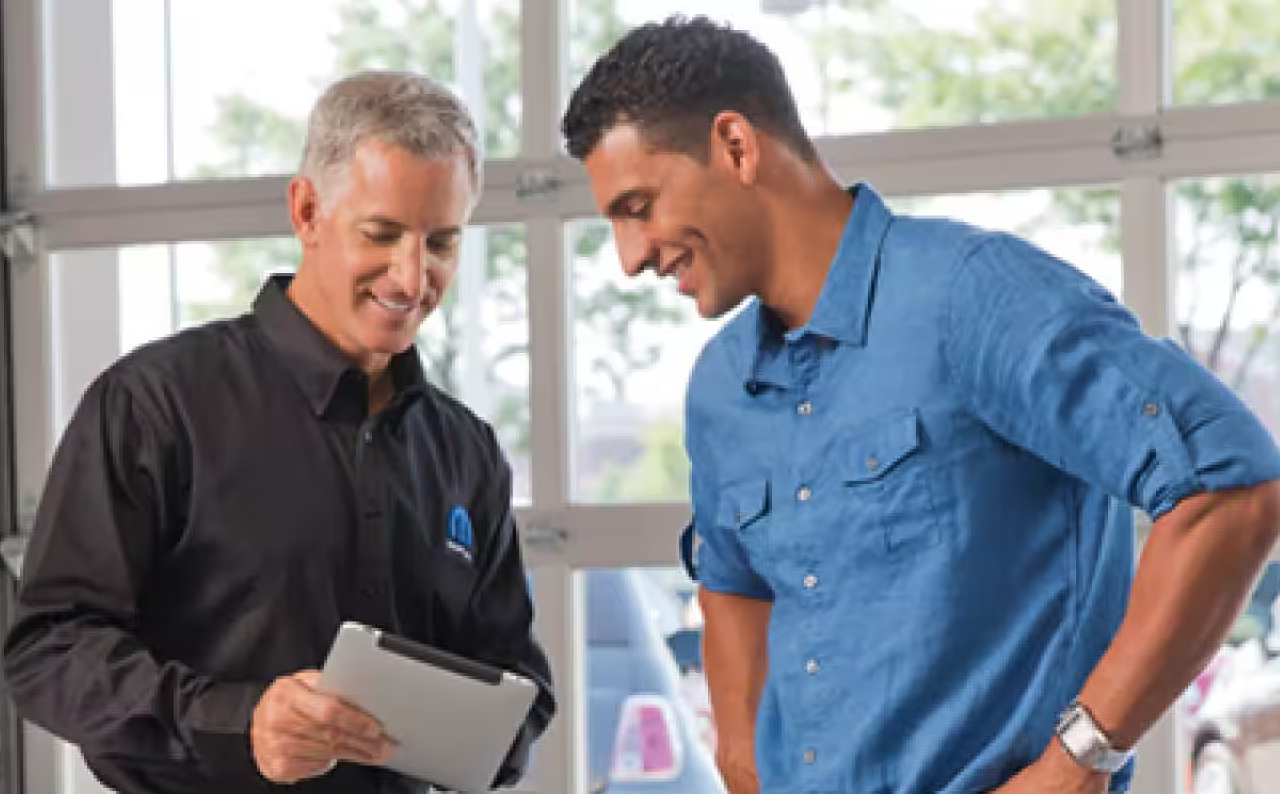 Chrysler Dodge Jeep Ram - staff helping customer to schedule for service feature