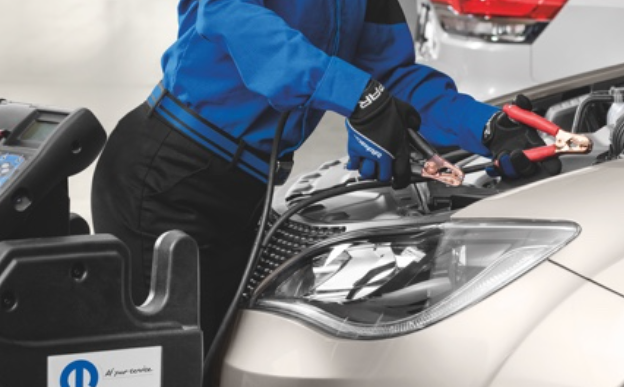 Chrysler Dodge Jeep Ram - technican checking on EVs battery - feature