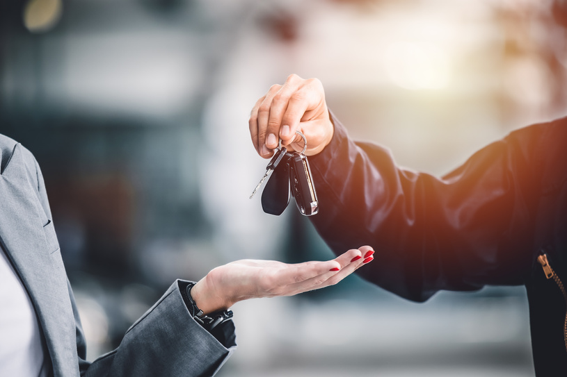 Dealership Rep Handing Over the Keys