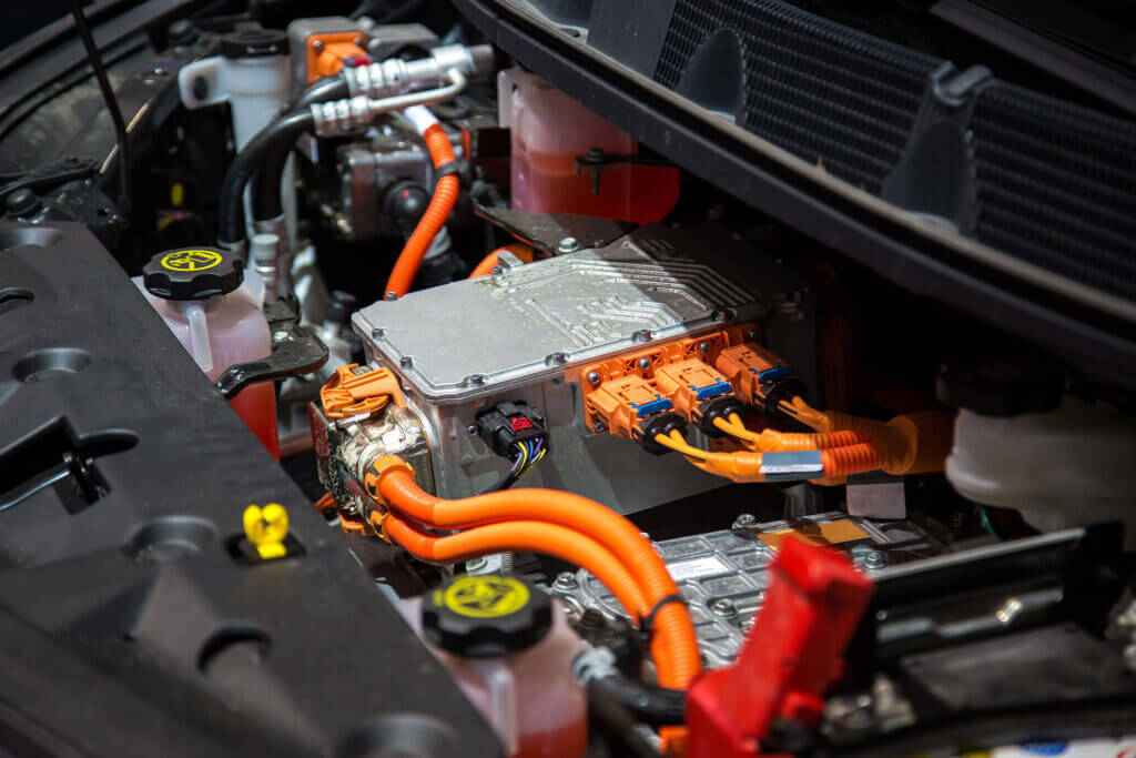 Electric Car Engine Motor Drive Unit Of An Electric Vehicle - Feature Image