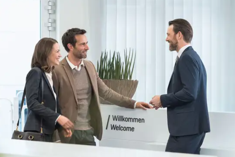 Finance expert greetings customer