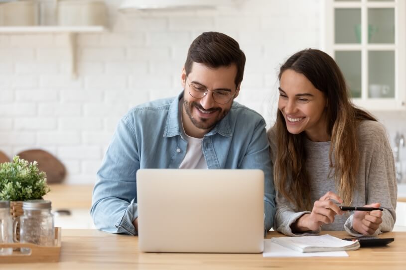 Financing - Couple Shopping Online
